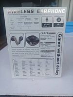 Box back showing product specs and features for TWS-301 wireless earphone.