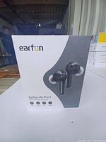 Front of retail box showing EarFun Air Pro 2 ANC Wireless Earbuds in black color.