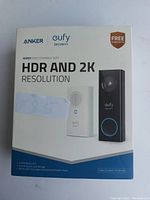 Front image of the product box showing the Anker Eufy wired video doorbell with HDR and 2K resolution text, and product image of the doorbell and chime unit.