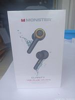 Front of retail box showing the Monster Clarity 108 Plus Airlinks wireless in-ear headphones.