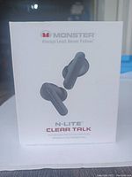 Front view of the Monster N-Lite Clear Talk wireless in-ear headphones box showing product image and branding.