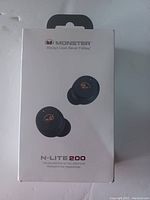 Front view of Monster N-Lite 200 wireless earbuds box showing the earbuds.