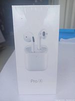 Front view of sealed box showing wireless earbuds and 'Pro 4' branding.