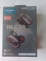 Front of Soundcore Liberty 2 Pro earbuds box showing earbuds image and key features like Qualcomm aptX, 22 hour playtime, wireless charging.