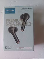 Front view of the Soundcore Liberty Air 2 earbuds box showing product name and key features such as premium call quality and Qualcomm aptX support.