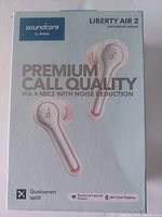 Front of Soundcore Liberty Air 2 box showing branding, product image, and key features such as premium call quality via 4 mics with noise reduction, Qualcomm aptX, diamond-inspired drivers, and 28H total playtime.