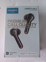 Front view of product box showing Soundcore Liberty Air 2 wireless earbuds and highlighting premium call quality via 4 mics with noise reduction, Qualcomm aptX, diamond-inspired drivers and 28H total playtime.