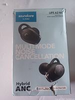 Box front showing Soundcore Life A2 NC wireless earbuds with hybrid multi-mode noise cancellation branding, image of earbuds black color.