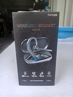 Front view of the black retail box displaying the Eumspo wireless headset Model G2 with key specs such as battery life and noise cancelling.