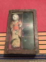 Doll in original box with clear lid showing overall condition and presentation