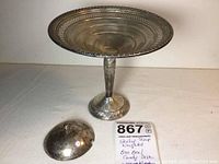 Bon bon candy dish standing upright with sugar bowl lid laying beside it, showing size and condition.