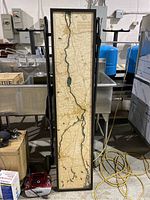 Full view of the framed Saint Lawrence River map art piece showing the entire river from Quebec to the southern end at Montreal.