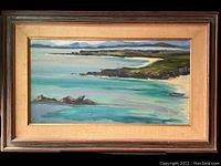 Framed landscape oil painting depicting an Irish coastal scene with mountains in background, water and sandy shore in foreground, showing overall condition and framing.