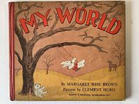 Front cover of 1949 original My World book showing brown landscape background, large tree, rabbit on swing, red text and red cloth spine