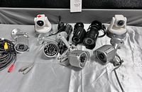 Front view showing all 10 security cameras of various types including PTZ and bullet cameras with cables.
