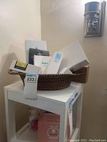 Full lot arranged inside woven basket showing various skincare product boxes and packaging.