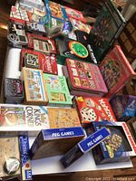 Overview of various boxed board games and card games such as Bingo, Yahtzee, Peg Games, Shut the Box, and King's Corner.