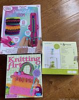 Three boxed kids craft sets including a paracord loom kit, knitting art kit, and mobile maker box