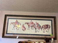 Full view of framed print on wall