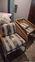 Two chairs side by side showing overall appearance and cushion pattern