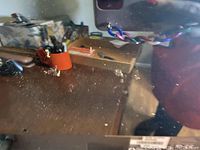 Close-up showing ports and some dust on the monitor surface.