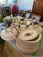 Full view of Myott Bonnie Dundee china set including plates, bowls, cups, and serving pieces arranged on a table.