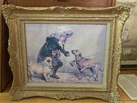 Full view of the framed print showing child with two dogs including a pug, in ornate gold antique wood frame.