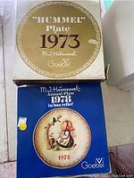 Box showing 1978 M.J. Hummel Annual Plate in bas relief design by Goebel