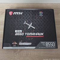 Front of boxed MSI MAG B550 Tomahawk motherboard