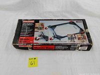 Boxed Craftsman Universal Mobile Base showing front package with product image and features.