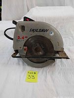Front view of the Skilsaw circular saw showing the blade, model 5175, 2.4 HP marking, and metal base plate.