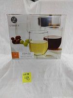Box of 12 stemless libbey glasses, shown unopened with product image and branding on box