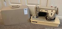 Singer sewing machine with base and power cord. Showing front and side views to identify model and condition.