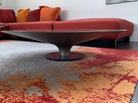 Side view showing low-profile conical metal base and clear glass top in situ