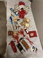 Full lot of assorted Christmas ornaments displayed on a surface