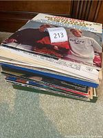 Stack of vinyl records with visible cover of Hank Dean & The Little Daddys on top
