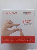 Front box showing brand, model JH-A39, and usability features such as easy operation and charging times.