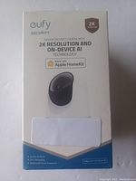 Front of retail box for Eufy Indoor Security Camera showing 2K resolution and Apple HomeKit compatibility
