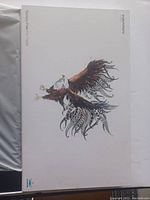 Closed white box with eagle artwork on the cover, showing product branding and package condition.