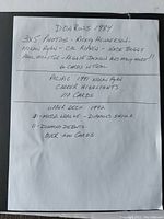 Handwritten note on white paper listing collections included: Donruss 1984 with Rickey Henderson, Nolan Ryan, Cal Ripken, and others; Pacific 1991 Nolan Ryan Career Highlights with 110 cards; Upper Deck 1992 Major League Diamond Skills and Rookie Debuts with over 200 cards.