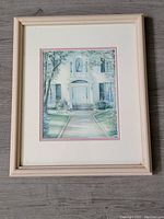Front framed watercolor print titled The Pathway by Trisha Romance.