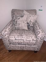 Front view of armchair with two matching cushions