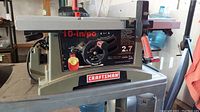 Front and side view of the Craftsman 10-inch electric table saw, overall look and condition.