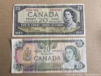 Front side of two Canadian $20 banknotes, 1954 on top, 1979 below, showing portraits of Queen Elizabeth II and denomination text.