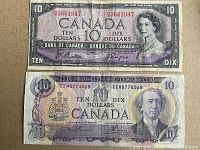 Front sides of both Canadian ten-dollar banknotes featuring Queen Elizabeth II (1954) and Sir John A. Macdonald (1971)