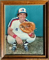 Framed signed photo of Gary Carter in Expos uniform crouching with catcher's mitt