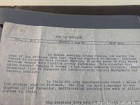 Close-up image of an August 4, 1944 typewritten communique detailing American troops in France, deployment details, and mention of Eisenhower and Montgomery.