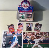 Full lot showing box of 1994 Cuban Select Series baseball cards, autographed cards of Vladislav Tretiak, Mickey Mantle, Roger Clemens, autographed photos of Ferguson Jenkins and Juan Guzman.