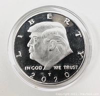Obverse side showing Donald Trump's profile with inscriptions LIBERTY, IN GOD WE TRUST, and year 2020.