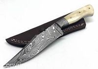Full view of the knife with sheath, showing blade, handle and leather sheath together.